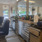 Barber stations and chairs at Two Macs Barber Shop